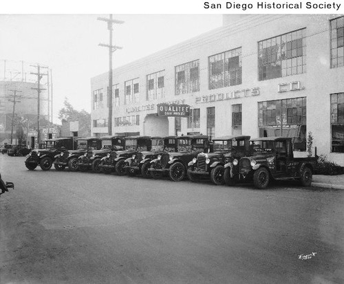 Delivery trucks parked in front of the Qualitee Dairy Products Company, 1929.